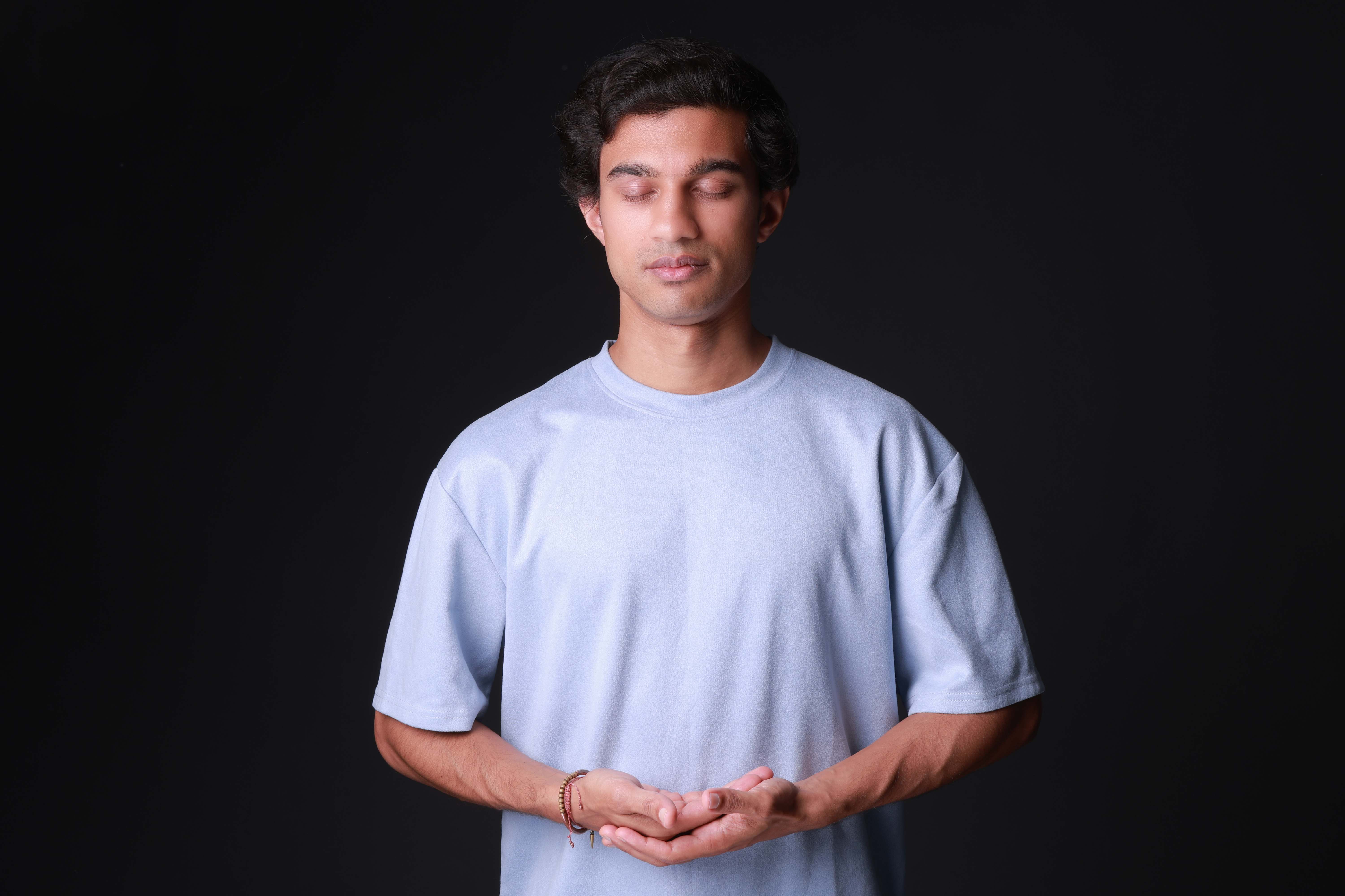 Rafie Faruq in a meditative pose during spiritual practice